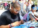 Visitors to the World Maker Faire in New York had a chance to build a small Morse code practice oscillator.